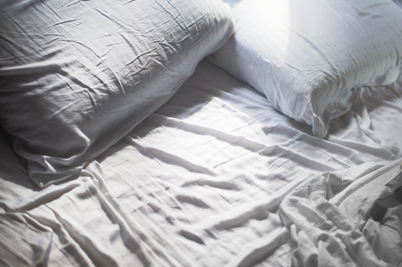 White bedding in soft natural light